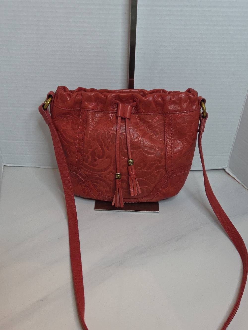 Fossil Coral Embossed Leather Crossbody with Tassels